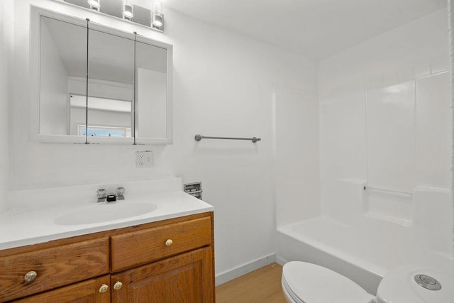 1937 W 15th Ave, Spokane, WA 99224 - bathroom featuring vanity, wood finished floors, and tub / shower combination