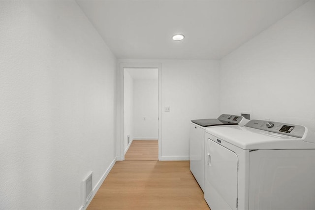1937 W 15th Ave, Spokane, WA 99224 - laundry room featuring washer and dryer and light wood finished floors