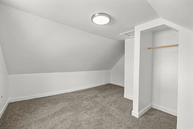 1937 W 15th Ave, Spokane, WA 99224 - additional living space featuring carpet, vaulted ceiling, and a textured ceiling