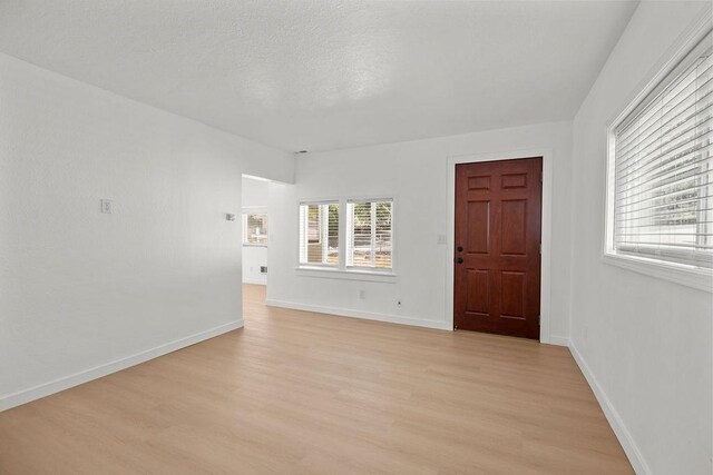 1937 W 15th Ave, Spokane, WA 99224 - spare room featuring light wood-style floors and baseboards