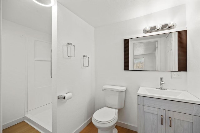1937 W 15th Ave, Spokane, WA 99224 - bathroom featuring vanity, a shower, and wood finished floors