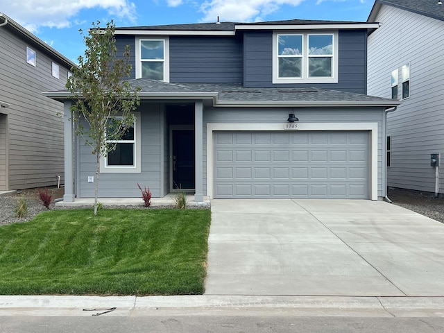 3745 S Keller Ln, Spokane Valley, WA 99206 - traditional-style home featuring driveway, a garage, and a front yard