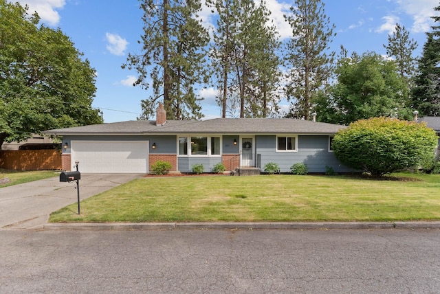 201 W Barnes Rd, Spokane, WA 99218 - ranch-style house with an attached garage, concrete driveway, brick siding, and a chimney