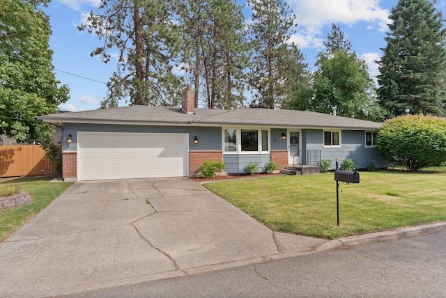 201 W Barnes Rd, Spokane, WA 99218 - ranch-style home with brick siding, an attached garage, concrete driveway, and a chimney