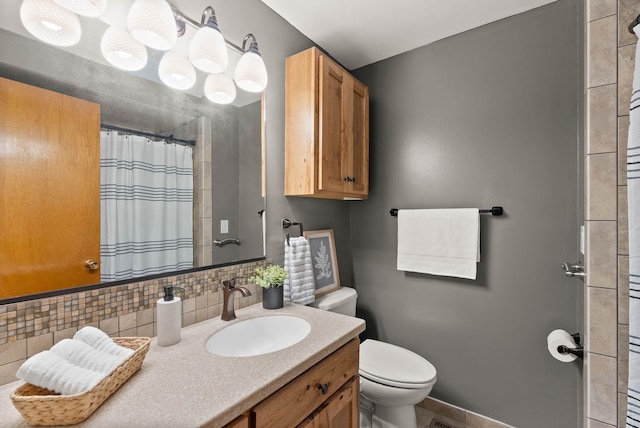 201 W Barnes Rd, Spokane, WA 99218 - bathroom with decorative backsplash, vanity, and a shower with curtain
