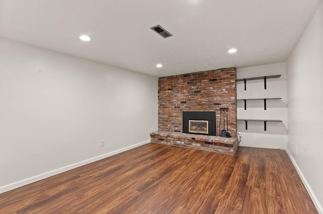 201 W Barnes Rd, Spokane, WA 99218 - unfurnished living room featuring wood finished floors, recessed lighting, and a fireplace