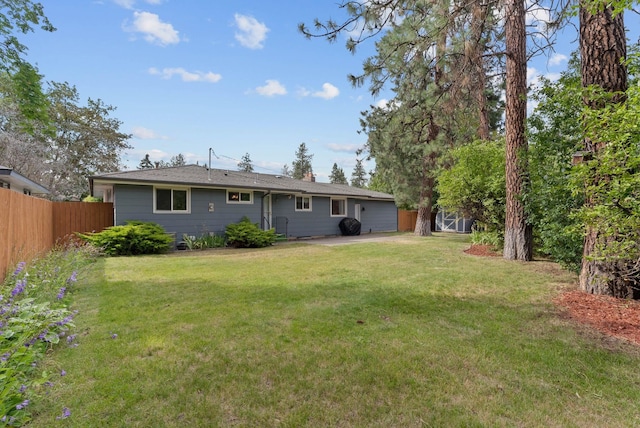 201 W Barnes Rd, Spokane, WA 99218 - back of house featuring a patio