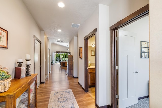 3316 N Coleman St, Post Falls, ID 83854 - hall featuring light wood finished floors and recessed lighting