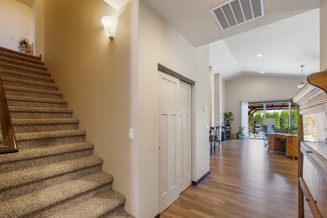 3316 N Coleman St, Post Falls, ID 83854 - stairs featuring vaulted ceiling, wood finished floors, ceiling fan, and recessed lighting