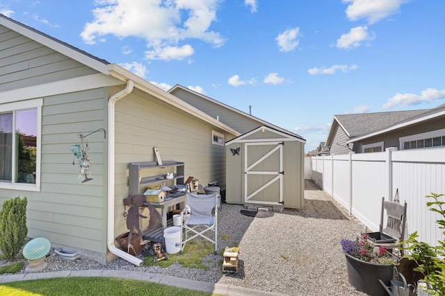3316 N Coleman St, Post Falls, ID 83854 - rear view of property featuring a storage unit