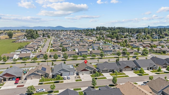 3316 N Coleman St, Post Falls, ID 83854 - aerial view of residential area featuring a mountain backdrop