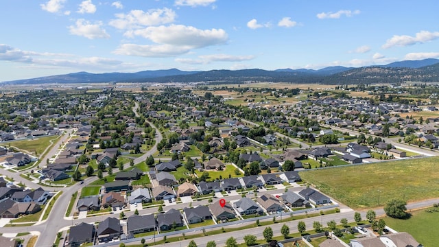 3316 N Coleman St, Post Falls, ID 83854 - aerial view of property's location featuring a mountainous background and nearby suburban area
