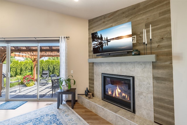 3316 N Coleman St, Post Falls, ID 83854 - living room with a tiled fireplace and wood finished floors