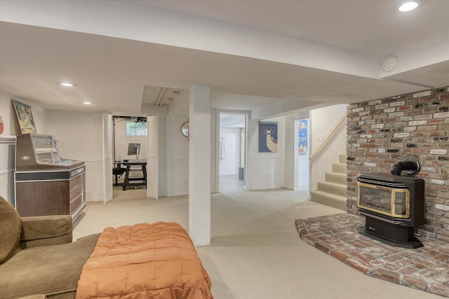 927 W 19th Ave, Spokane, WA 99203 - living area with light colored carpet, a wood stove, and recessed lighting