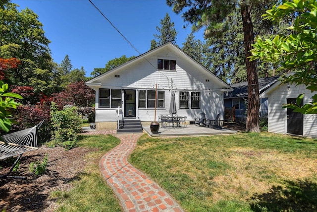 927 W 19th Ave, Spokane, WA 99203 - back of house with entry steps, a yard, and a patio area
