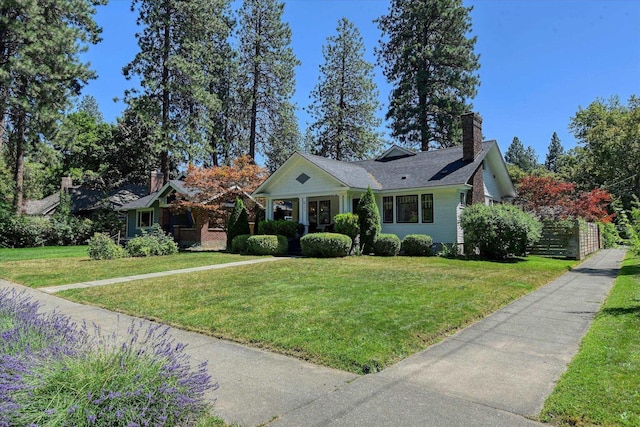 927 W 19th Ave, Spokane, WA 99203 - view of front of home featuring a front yard and a chimney