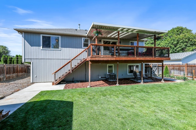 11606 E 8th Ave, Spokane Valley, WA 99206 - rear view of house featuring stairs, a wooden deck, and a fenced backyard