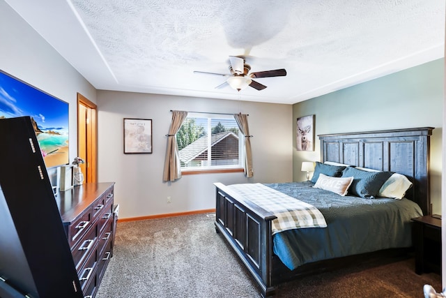 11606 E 8th Ave, Spokane Valley, WA 99206 - bedroom with dark colored carpet, a textured ceiling, and ceiling fan