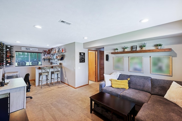 11606 E 8th Ave, Spokane Valley, WA 99206 - living room featuring a dry bar, light carpet, and recessed lighting