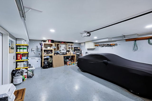 11606 E 8th Ave, Spokane Valley, WA 99206 - garage with a garage door opener and recessed lighting