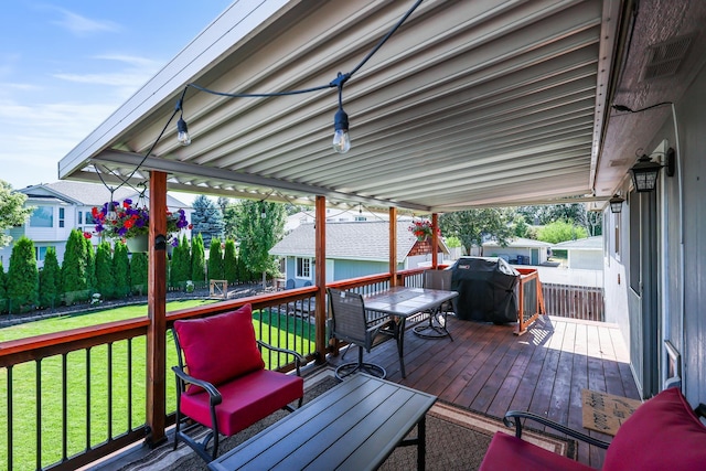 11606 E 8th Ave, Spokane Valley, WA 99206 - deck featuring an outdoor structure, a grill, a fenced backyard, and outdoor dining space