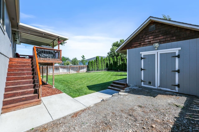 11606 E 8th Ave, Spokane Valley, WA 99206 - fenced backyard with a storage unit and stairs