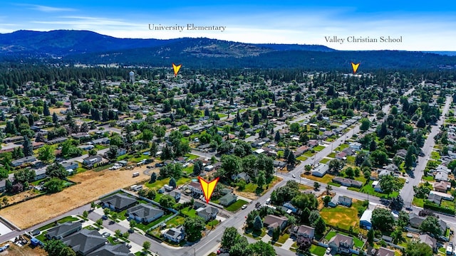 11606 E 8th Ave, Spokane Valley, WA 99206 - aerial view of property's location featuring a mountainous background and a heavily wooded area