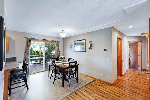 11606 E 8th Ave, Spokane Valley, WA 99206 - dining space featuring light wood-style floors, recessed lighting, and a textured ceiling