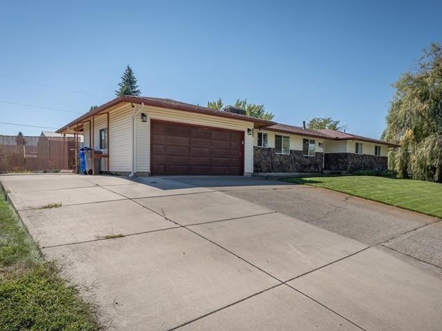 10108 E 19th Ave, Spokane Valley, WA 99206 - single story home with a garage and concrete driveway