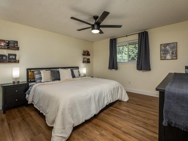 10108 E 19th Ave, Spokane Valley, WA 99206 - bedroom with wood finished floors, a textured ceiling, and a ceiling fan