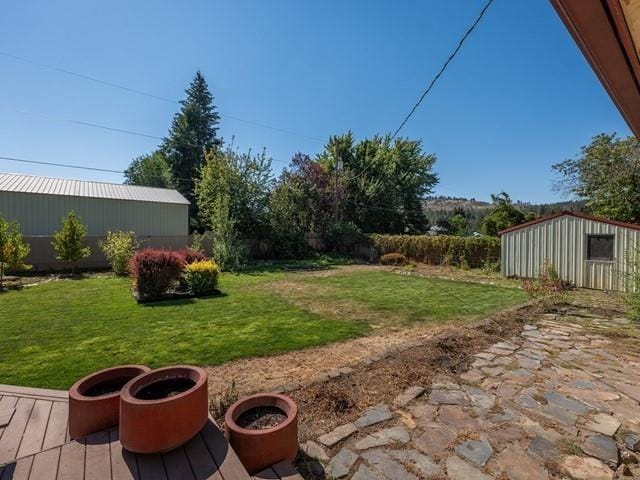 10108 E 19th Ave, Spokane Valley, WA 99206 - view of yard featuring an outbuilding