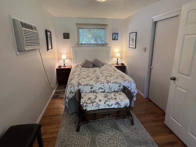 816 S Mamer Rd, Spokane Valley, WA 99216 - bedroom with wood finished floors and a wall mounted air conditioner