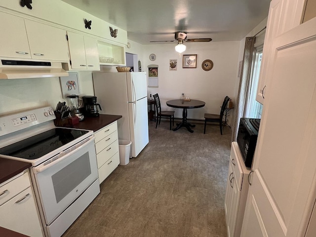 816 S Mamer Rd, Spokane Valley, WA 99216 - kitchen with white appliances, under cabinet range hood, ceiling fan, dark countertops, and white cabinets