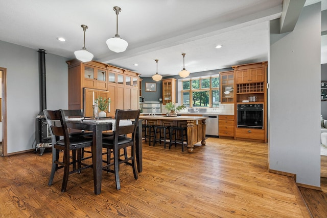 6204 E Custer Ln, Spokane, WA 99223 - dining space featuring light wood-style flooring and recessed lighting
