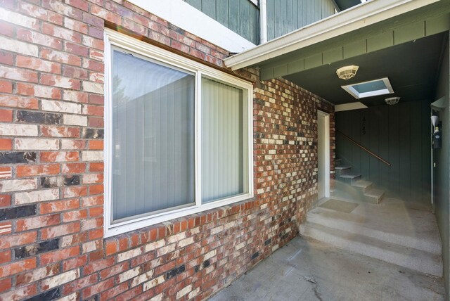 6125 N Addison St, Spokane, WA 99208 - view of exterior entry featuring brick siding