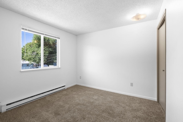 6125 N Addison St, Spokane, WA 99208 - carpeted spare room featuring baseboard heating and a textured ceiling