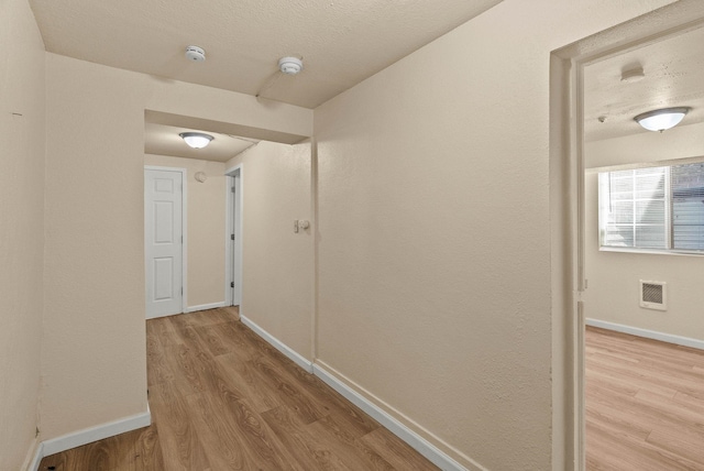 903 S Adams St, Spokane, WA 99204 - corridor with wood finished floors and baseboards
