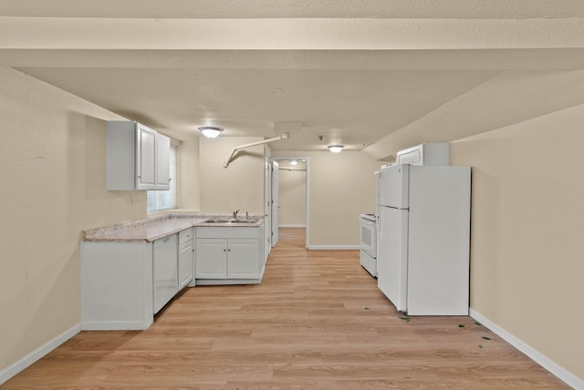 903 S Adams St, Spokane, WA 99204 - kitchen featuring white appliances, light countertops, white cabinetry, and light wood finished floors