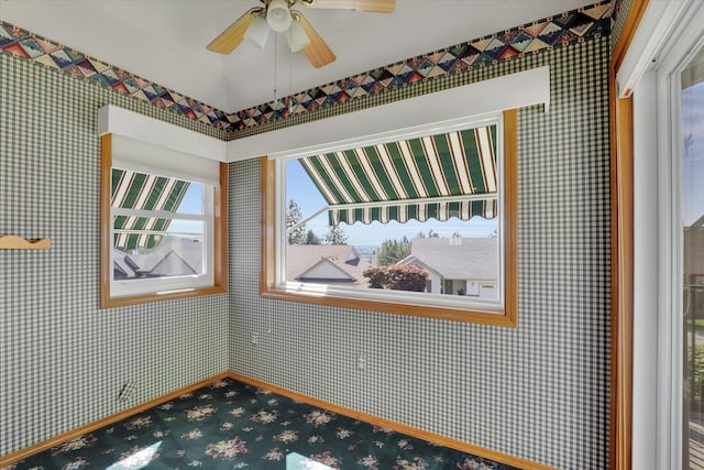 8722 E Boardwalk Ln, Spokane, WA 99212 - empty room with a ceiling fan, carpet, and wallpapered walls