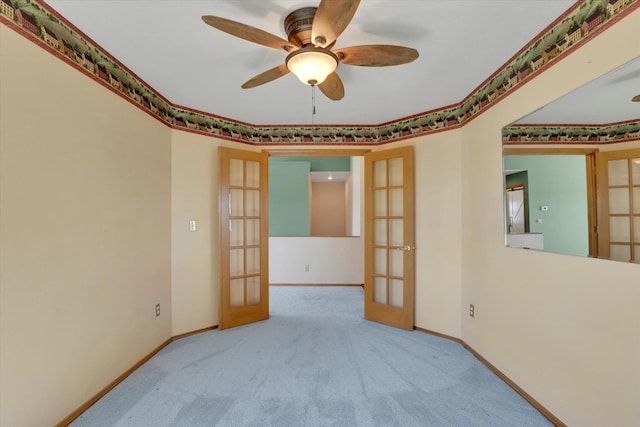 8722 E Boardwalk Ln, Spokane, WA 99212 - spare room with french doors, carpet flooring, and a ceiling fan