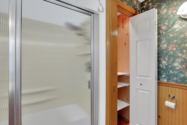 8722 E Boardwalk Ln, Spokane, WA 99212 - full bathroom with wallpapered walls, a shower stall, and wainscoting