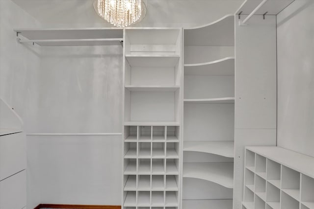 8722 E Boardwalk Ln, Spokane, WA 99212 - walk in closet featuring a chandelier