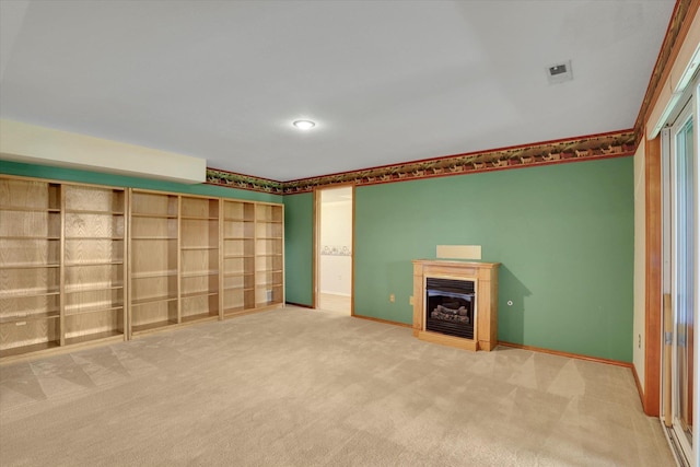 8722 E Boardwalk Ln, Spokane, WA 99212 - unfurnished living room featuring a glass covered fireplace and carpet floors