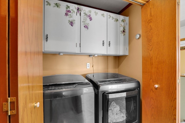 8722 E Boardwalk Ln, Spokane, WA 99212 - laundry room featuring cabinet space and separate washer and dryer