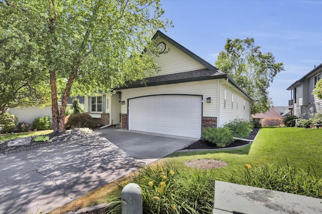 8722 E Boardwalk Ln, Spokane, WA 99212 - ranch-style house featuring concrete driveway, an attached garage, brick siding, and a front yard