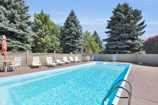 8722 E Boardwalk Ln, Spokane, WA 99212 - view of swimming pool with a patio