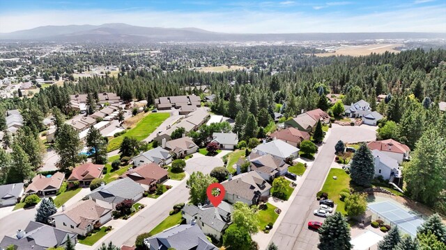 8722 E Boardwalk Ln, Spokane, WA 99212 - aerial perspective of suburban area with a mountainous background