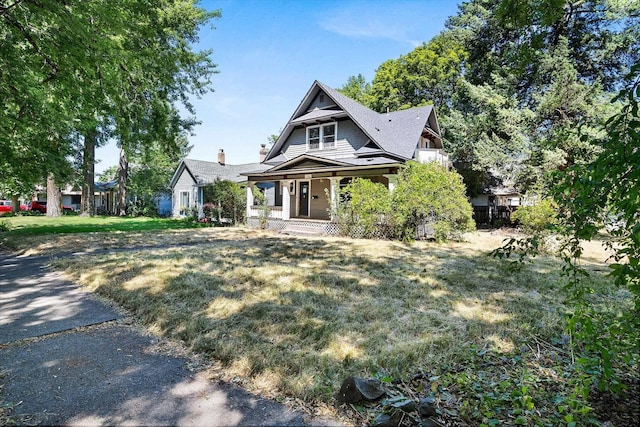1304 W 15th Ave, Spokane, WA 99203 - view of front of home with a porch and a front lawn