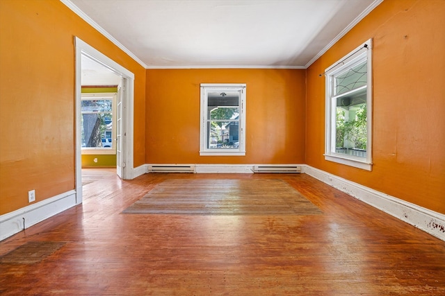 1304 W 15th Ave, Spokane, WA 99203 - unfurnished room with a baseboard radiator, plenty of natural light, ornamental molding, and wood finished floors