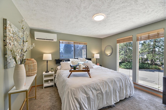4232 E 10th Ave, Spokane, WA 99202 - carpeted bedroom featuring a wall mounted air conditioner, access to outside, multiple windows, and a textured ceiling